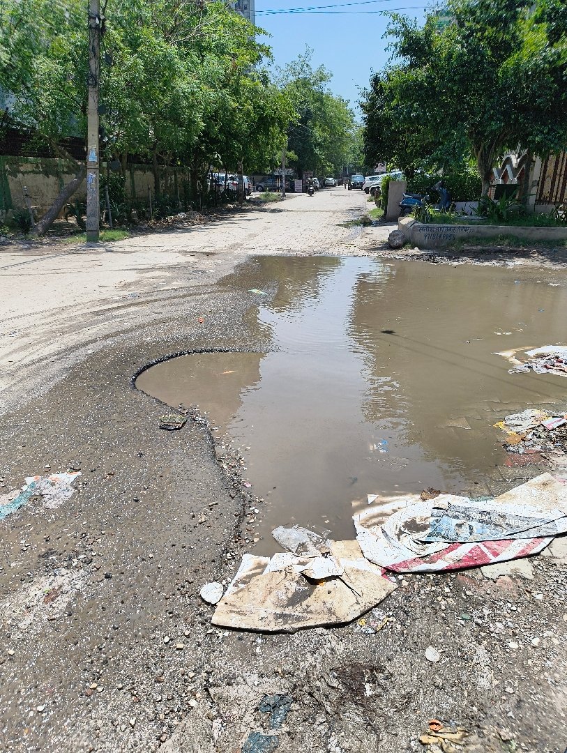 Broken road near SG Homes.
No repair yet