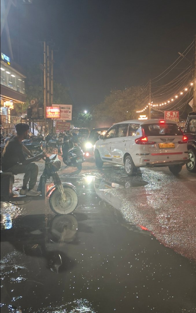 congestion due to broken road outside SG Homes