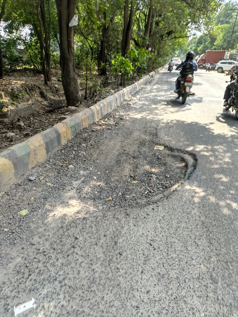 massive pothole near sector 5 Vasundhara Hindon back road